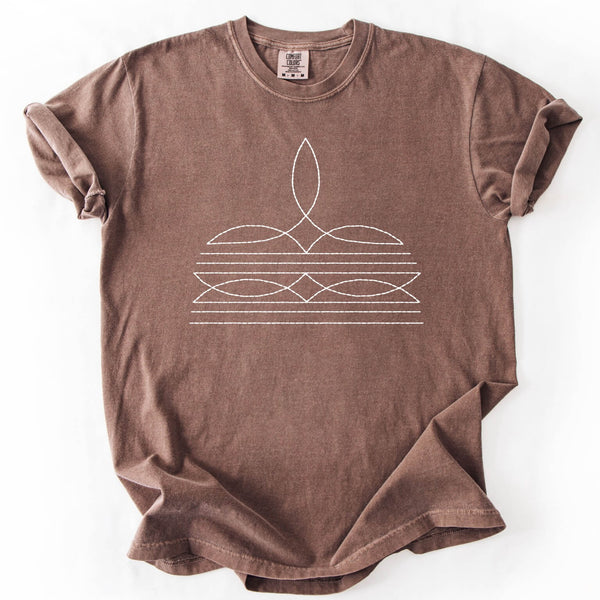 Brown t-shirt with white geometric design on a white background