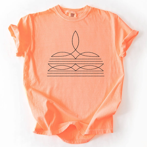 Orange t-shirt with a black geometric design on a white background