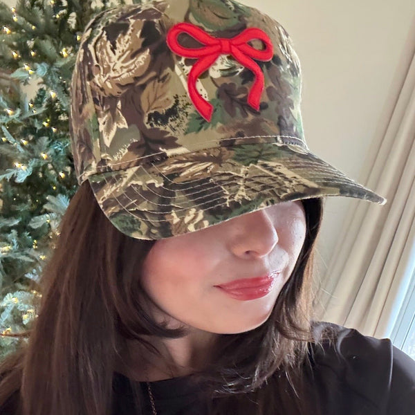 Coquette Red Bow Camo Trucker Hat | Country Girl Fashion | Adjustable Velcro Back - The Stenciled Barn
