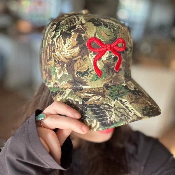 Coquette Red Bow Camo Trucker Hat | Country Girl Fashion | Adjustable Velcro Back - The Stenciled Barn