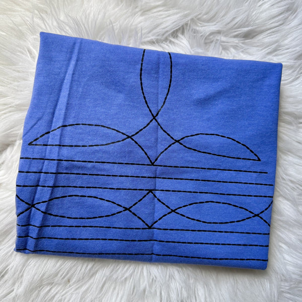 Western boot stitch graphic tee on Flo Blue Comfort Colors shirt featuring black stitched cowboy boot pattern