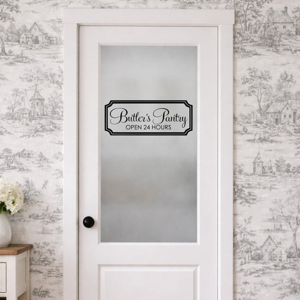 Frosted glass door with a vinyl sign reading 'Butler's Pantry Open 24 Hours' in a decorative room.