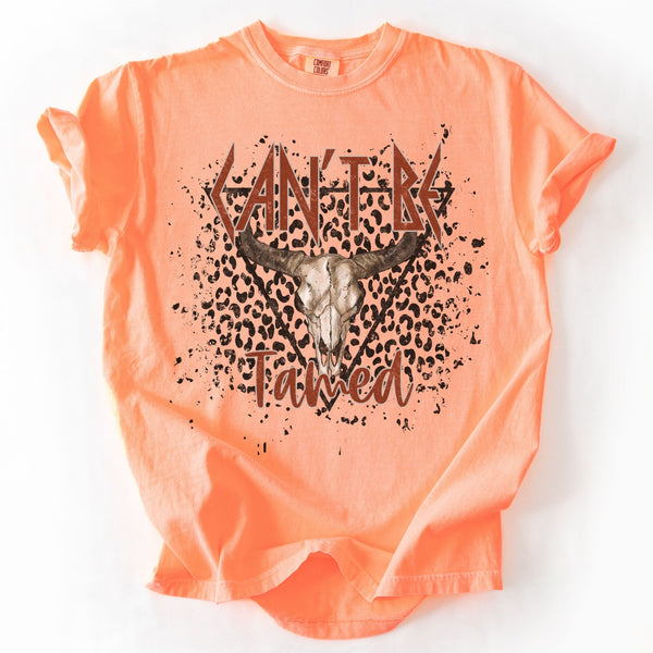 Coral t-shirt with a graphic design and text on a white background