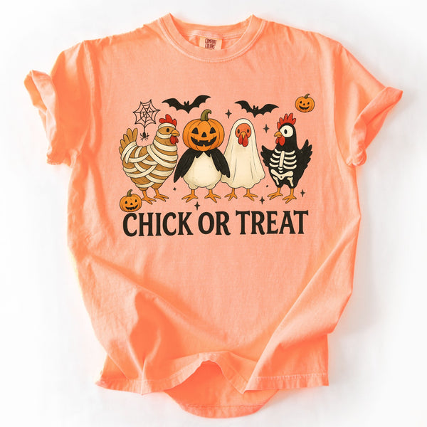 Chick or Treat Halloween chicken graphic printed on a Comfort Colors peach unisex graphic tee