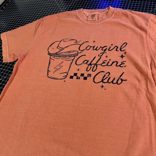Cowgirl Caffeine Club western graphic t-shirt with coffee cup and cowboy hat design