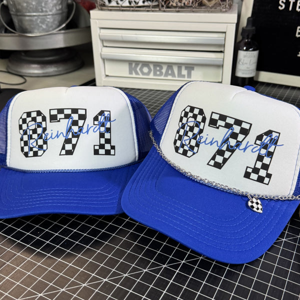 Personalized motocross trucker hat with custom race number and rider name in royal blue with checkered racing design