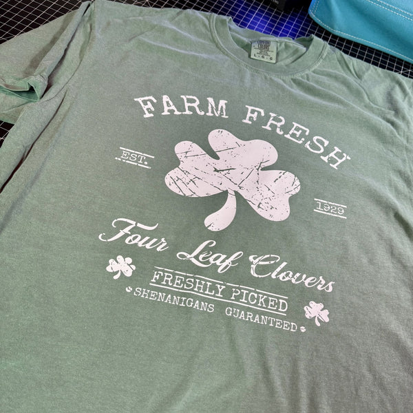 Green Farm Fresh Four Leaf Clovers western St Patricks Day graphic tee with distressed shamrock design