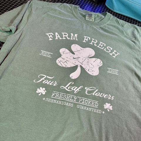 Green Farm Fresh Four Leaf Clovers western St Patricks Day graphic tee with distressed shamrock design