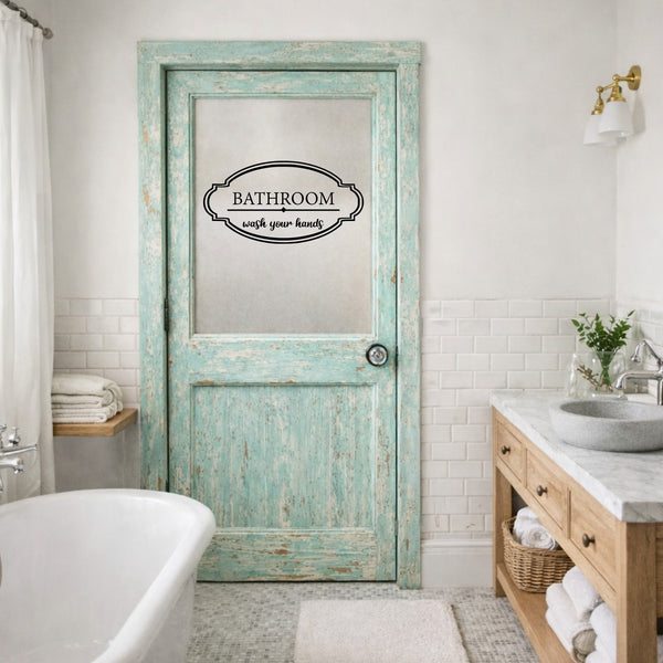 Bathroom with a distressed green door featuring a vinyl decal that reads 'Bathroom with your hands'.