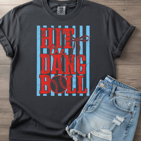 Gray t-shirt with red and blue baseball graphic design on a wooden background