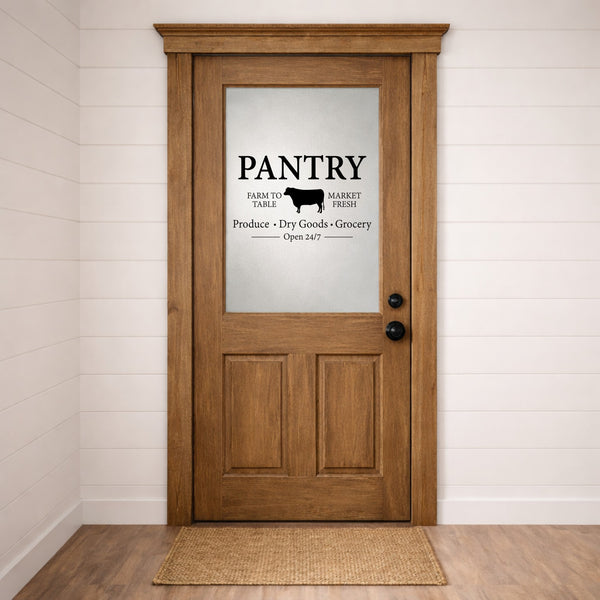 Wooden pantry door with glass panel and 'Pantry' door decal sign on a white wall.