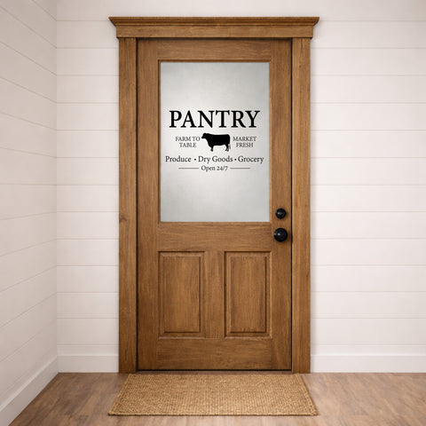 Wooden pantry door with glass panel and 'Pantry' door decal sign on a white wall.