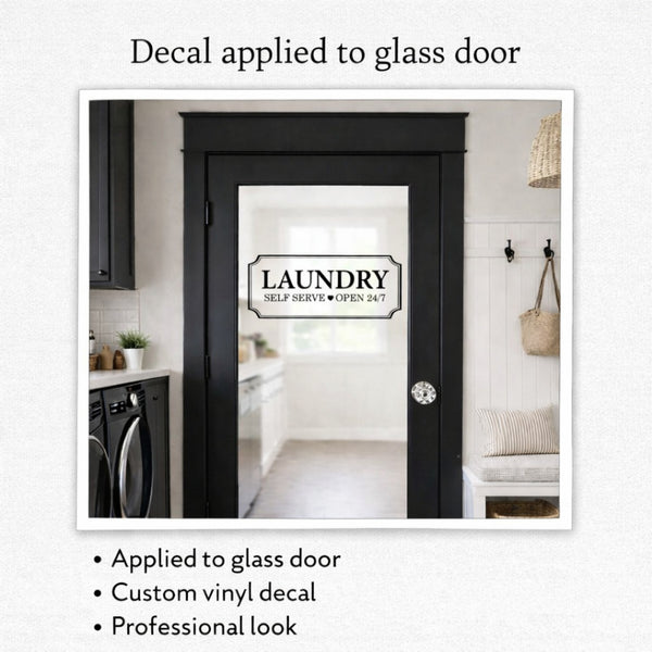 Laundry room with a glass door featuring a custom vinyl decal.