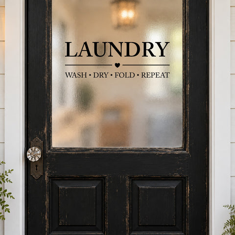 Black Laundry Wash Dry Fold Repeat vinyl decal displayed on farmhouse black frosted glass laundry room door