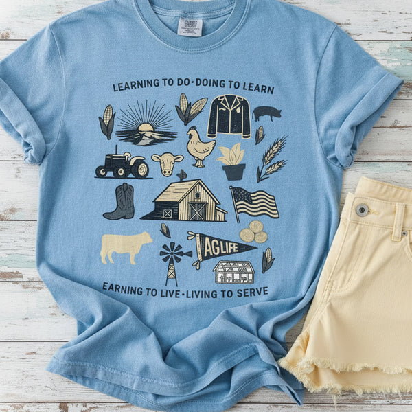 Ag Life farm graphic tee with livestock and barn design on Comfort Colors shirt