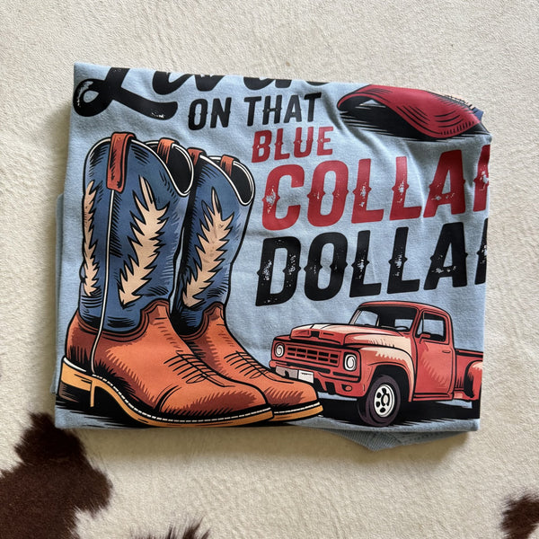 Living on That Blue Collar Dollar graphic tee featuring cowboy boots and vintage red pickup truck design on light blue shirt