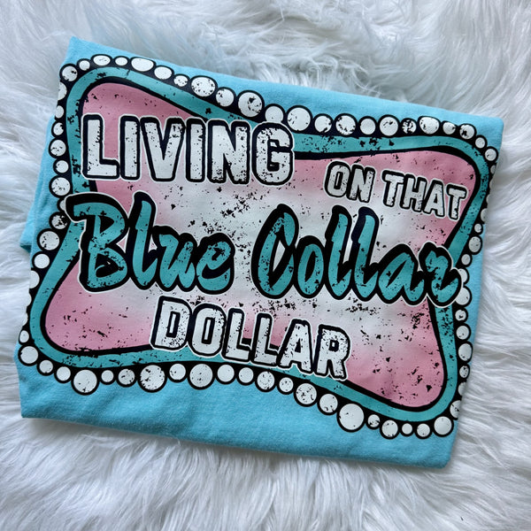 Living on That Blue Collar Dollar graphic tee on lagoon blue shirt with western marquee sign design