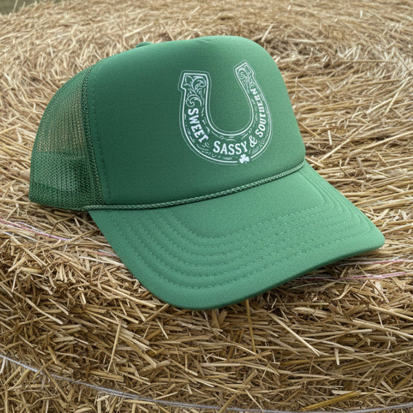 Green Sweet Sassy and Southern horseshoe St Patrick’s Day trucker hat with white western design