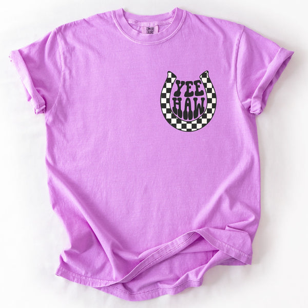 Purple t-shirt with a checkered pattern horseshoe graphic and 'Yee Haw' text on a white background