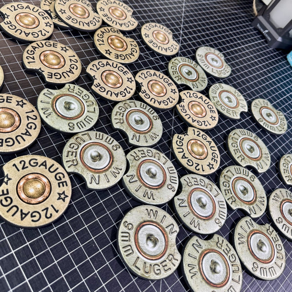12 gauge shotgun shell neoprene car coasters featuring realistic brass and silver bullet casing designs