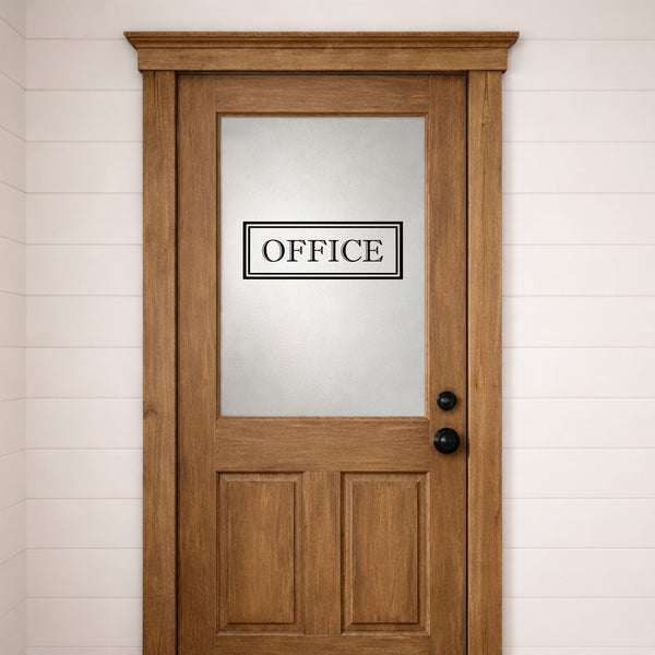 Wooden door with a glass panel and 'OFFICE' door decal on a white wall.