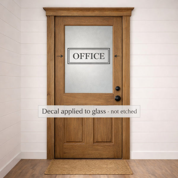 Wooden door with glass panel featuring an 'OFFICE' door decal on a white wall.