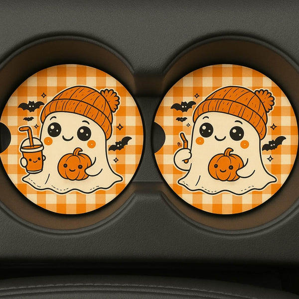 Two Halloween-themed car coasters with ghosts, pumpkins, and bats on a checkered background.