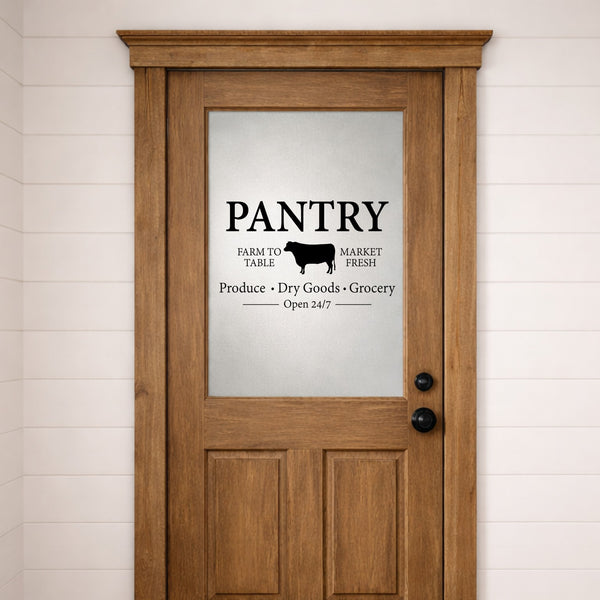 Wooden pantry door with glass panel and 'Pantry' vinyl decal.