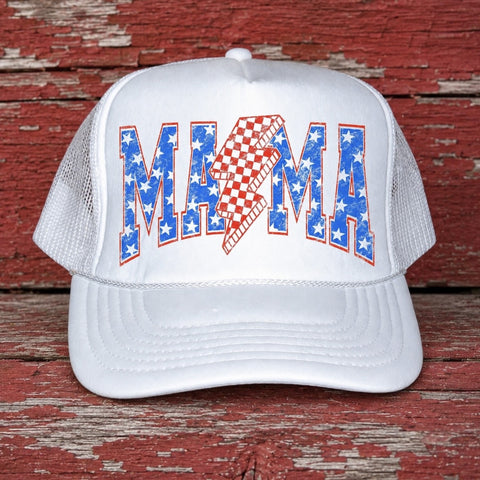 White patriotic mama trucker hat featuring red white and blue stars with a checkered lightning bolt design on a rustic red barn wood background