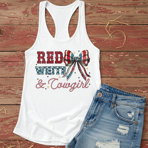 Patriotic white racerback tank top with 'Red White & Cowgirl' design and blue jeans on a red wooden background