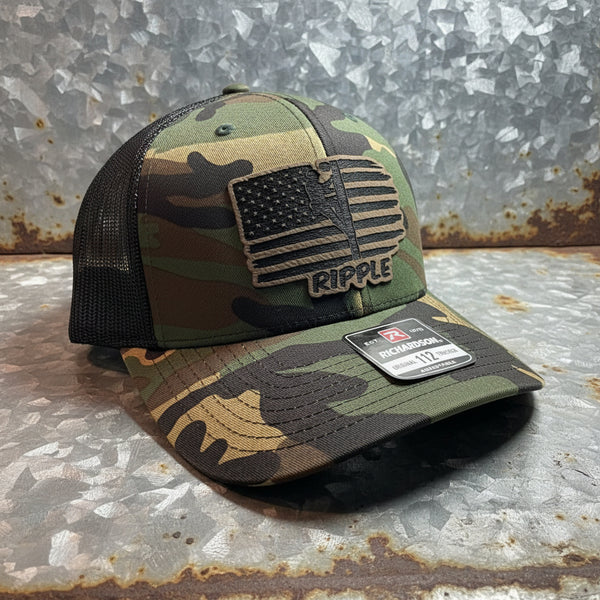 Camo Richardson 112 trucker hat with USA flag lineman leather patch — personalized last name