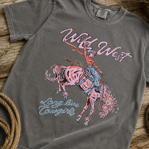 Wild West cowgirl riding bucking horse graphic tee in charcoal gray with retro pink and blue rodeo design
