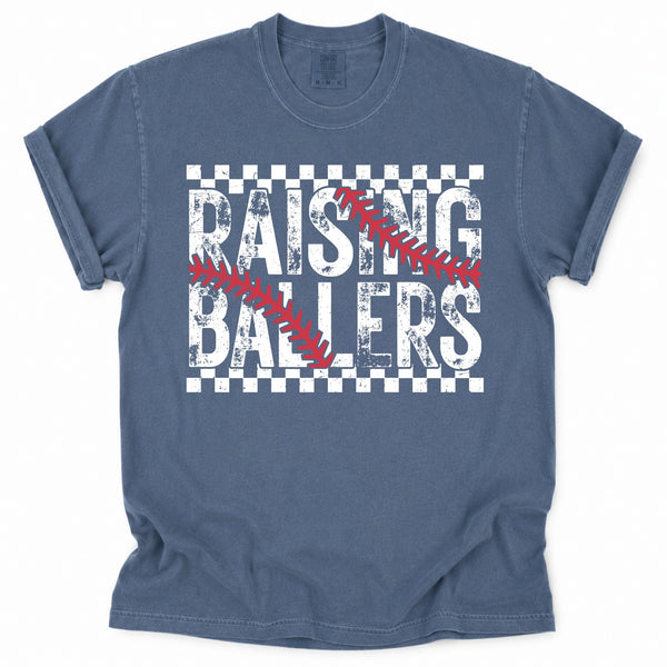 Blue t-shirt with 'Raising Ballers' text and baseball design on a white background
