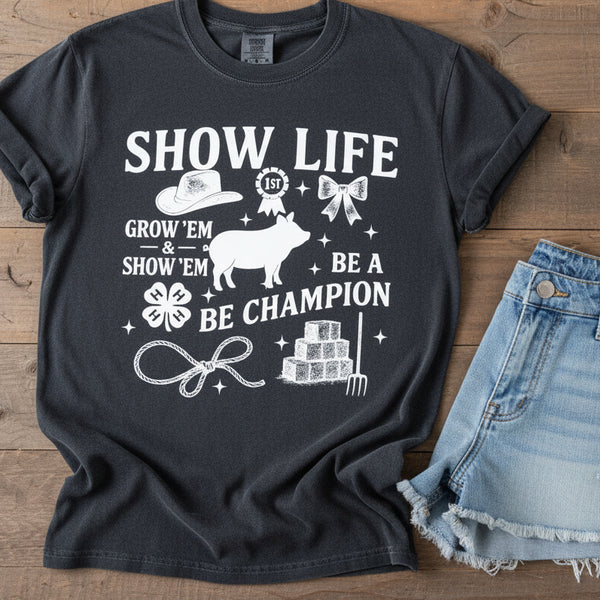 Show Life Grow Em Show Em livestock graphic tee on Comfort Colors shirt for FFA 4H cattle show life with pig silhouette and farm icons