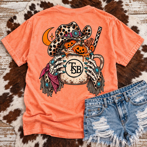Comfort Colors Neon Cantaloupe cowgirl Halloween tee with leopard hat pumpkin spice mug pumpkins and turquoise Western details