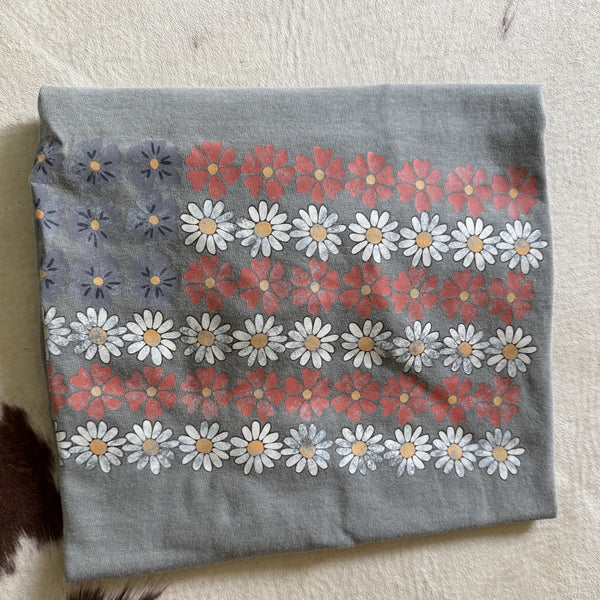USA floral flag graphic tee featuring daisy and wildflower American flag design on gray shirt