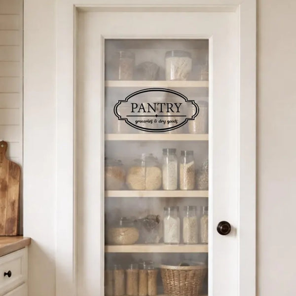 Pantry door with glass panels displaying food items and a 'PANTRY' door sign.