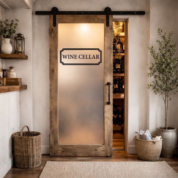 Wine cellar farmhouse door decal on frosted glass sliding barn door with rustic wood frame